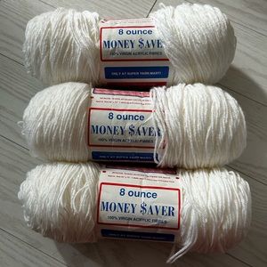 3- 8oz skeins white acrylic yarn.